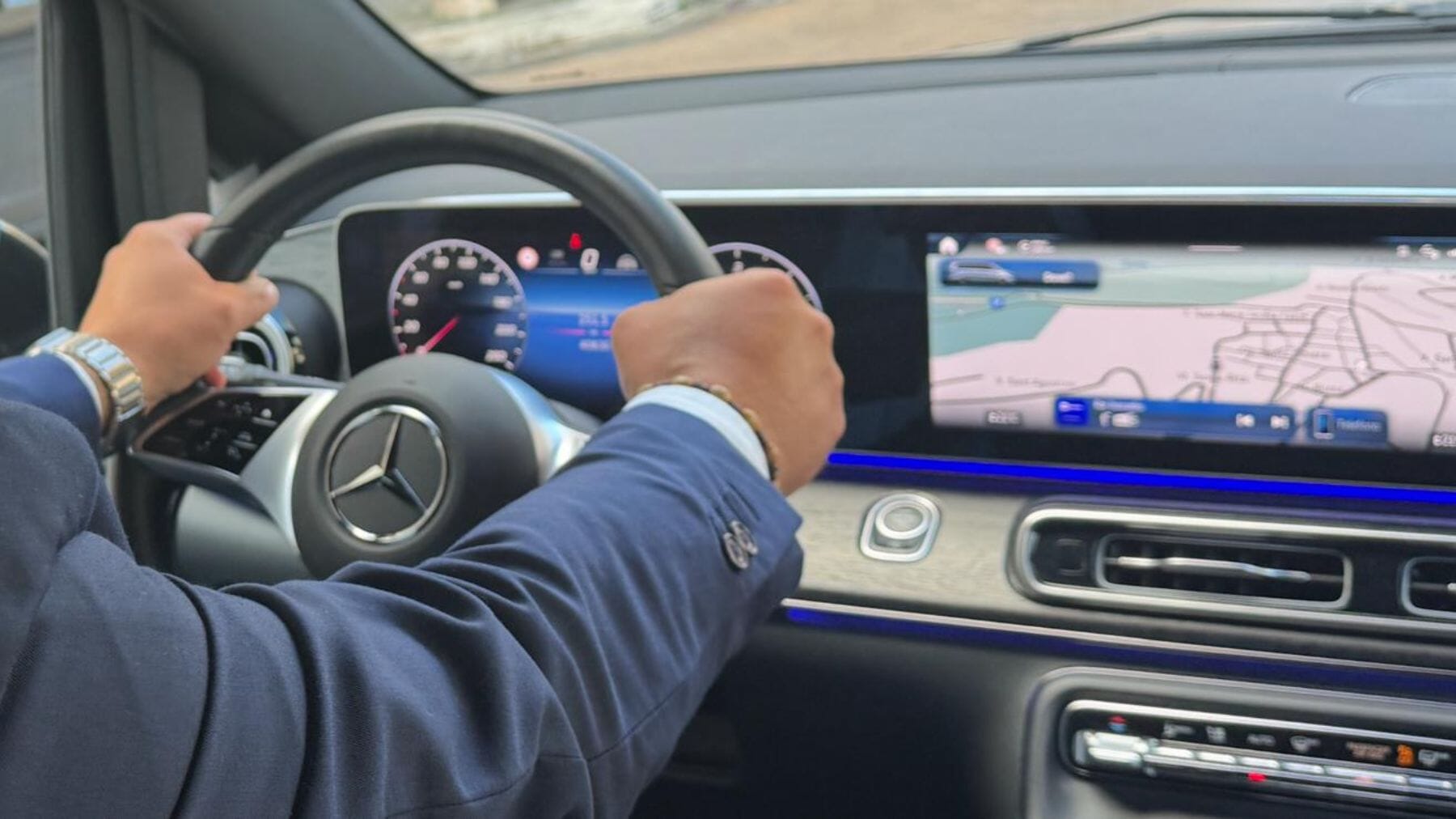 Professional private driver in Italy with a luxury sedan